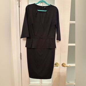 Chic Black Dress with Peplum Detail